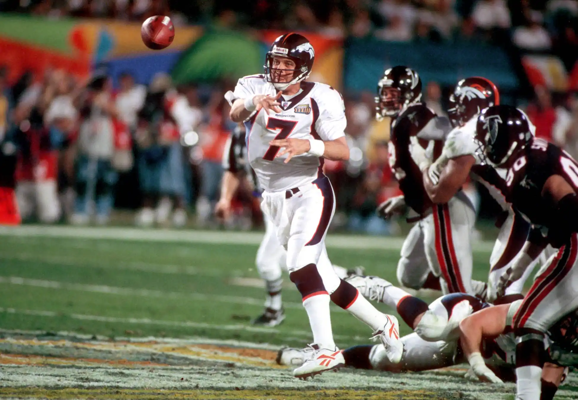 Jan 31, 1999; Miami, FL, USA; FILE PHOTO; Denver Broncos quarterback (7) JOHN ELWAY in action against the Atlanta Falcons during Super Bowl XXXIII at Pro Player Stadium. Elway passed for 336 yards and ran for 1 touchdown as the Broncos defeated the Falcons 34-19 to earn back to back Super Bowl Titles. 