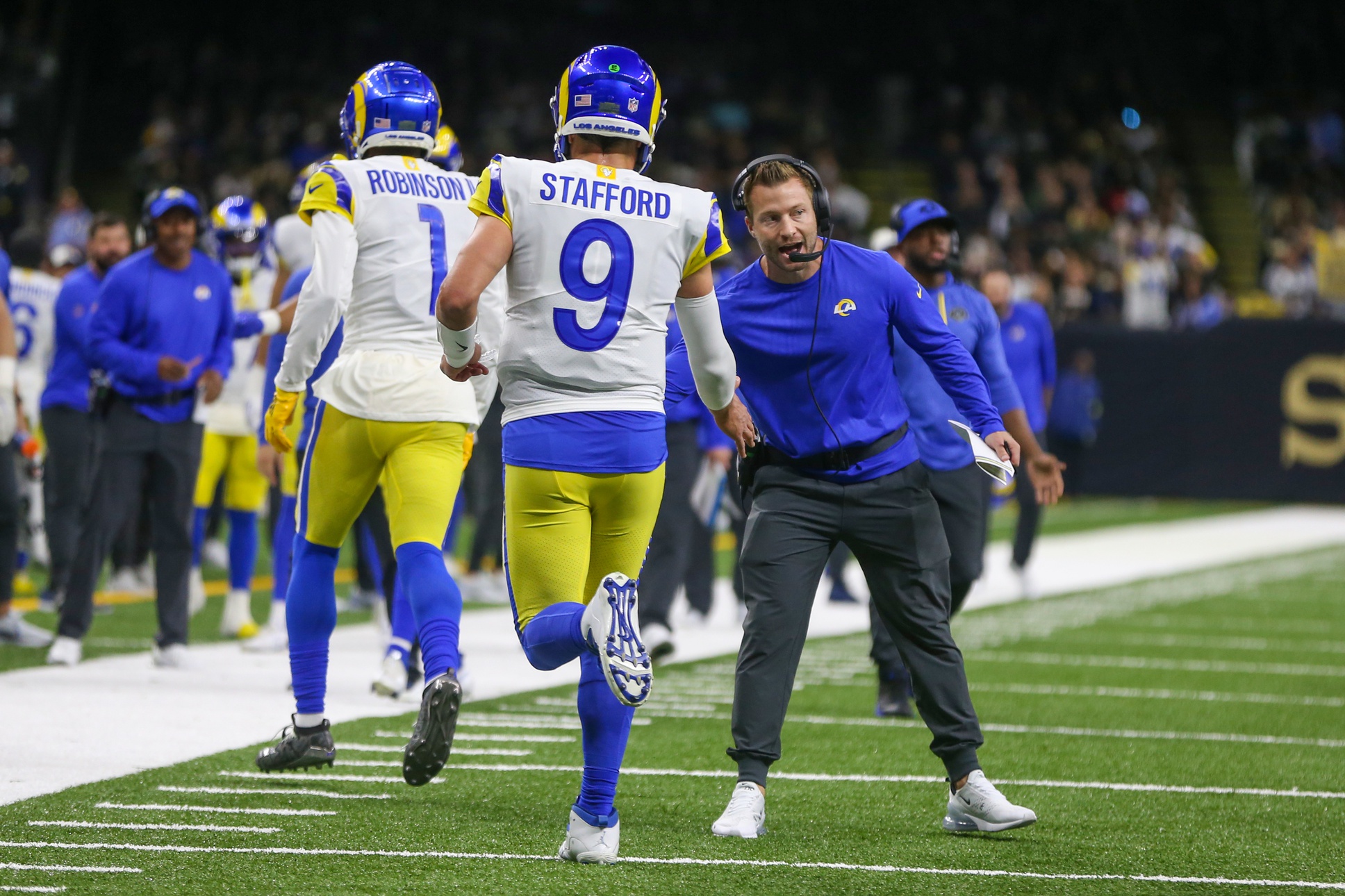 Nov 20, 2022; New Orleans, Louisiana, USA; Los Angeles Rams head coach Sean McVay congratulates quarterback Matthew Stafford (9) after a touchdown pass in the second quarter against the New Orleans Saints at the Caesars Superdome. Mandatory Credit: Chuck Cook-USA TODAY Sports

