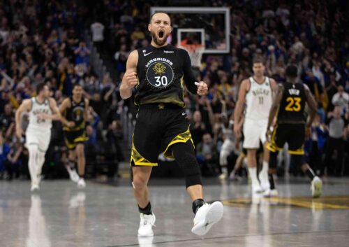 
Mar 11, 2023; San Francisco, California, USA; Golden State Warriors guard Stephen Curry (30) reacts after making a three point basket to tie the score against the Milwaukee Bucks during the fourth quarter at Chase Center. Mandatory Credit: D. Ross Cameron-USA TODAY Sports
