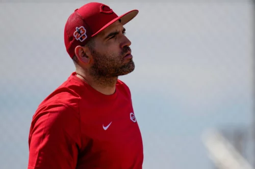 
Cincinnati Reds first baseman Joey Votto (19) watches between rounds of batting practice at the Cincinnati Reds Player Development Complex in Goodyear, Ariz., on Thursday, Feb. 23, 2023. © Sam Greene/The Enquirer / USA TODAY NETWORK Joey Votto is 39 years old.
