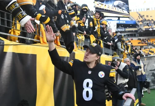 
Jan 8, 2023; Pittsburgh, Pennsylvania, USA; Pittsburgh Steelers quarterback Kenny Pickett (8) greets fans following a 28-14 win over the Cleveland Browns at Acrisure Stadium. Mandatory Credit: Philip G. Pavely-USA TODAY Sports
